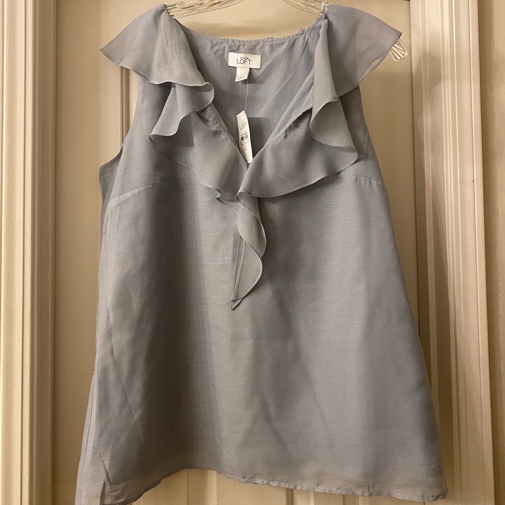 Blue Sleeveless Blouse with Ruffles